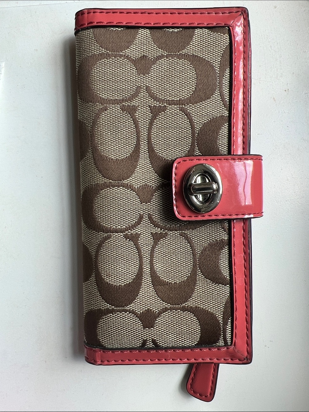 Coach Signature Canvas Phone Wallet with Coral Pink Trim
